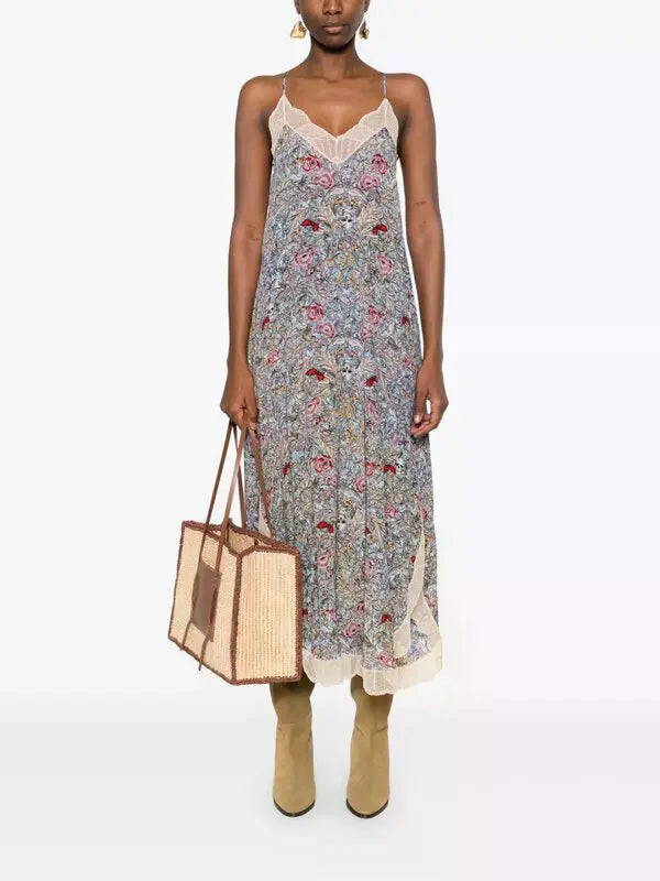 The Zadig & Voltaire Rystyl midi dress combines delicate lace detailing with a flattering V-neckline and slender spaghetti straps, creating an elegant silhouette. Designed in neutral tones, this versatile midi dress offers refined style suitable for both daytime and evening occasions.