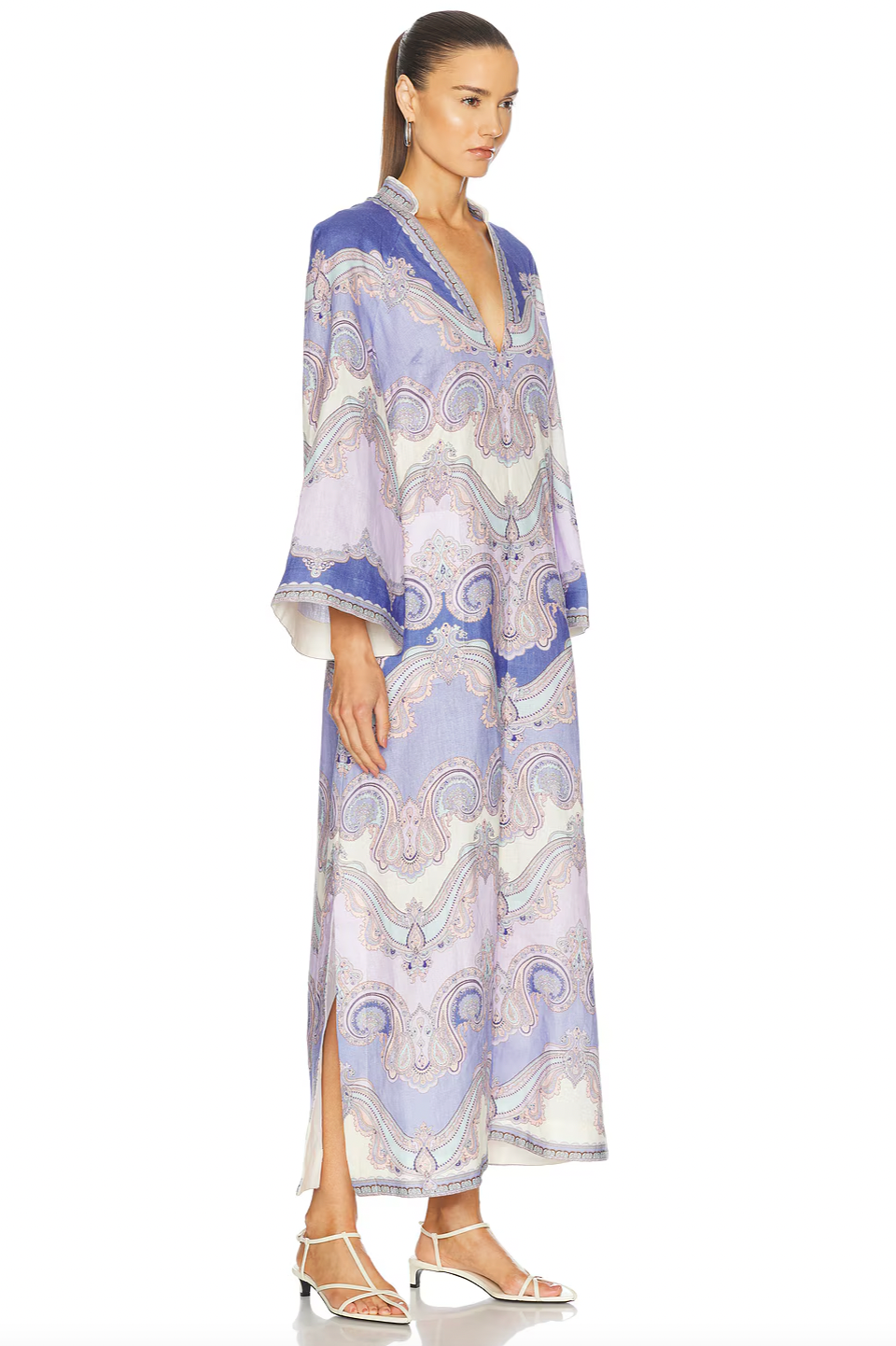 Elevate your wardrobe with the Maxine Midi Dress in delicate light purple by Zimmermann. Expertly designed with a plunging V-neckline and discreet rear zip, it offers both sophistication and comfort. Practical front patch pockets blend seamlessly with the refined silhouette, while side slits provide fluid movement and effortless elegance. Ideal for those seeking a polished look with functional details at any event.