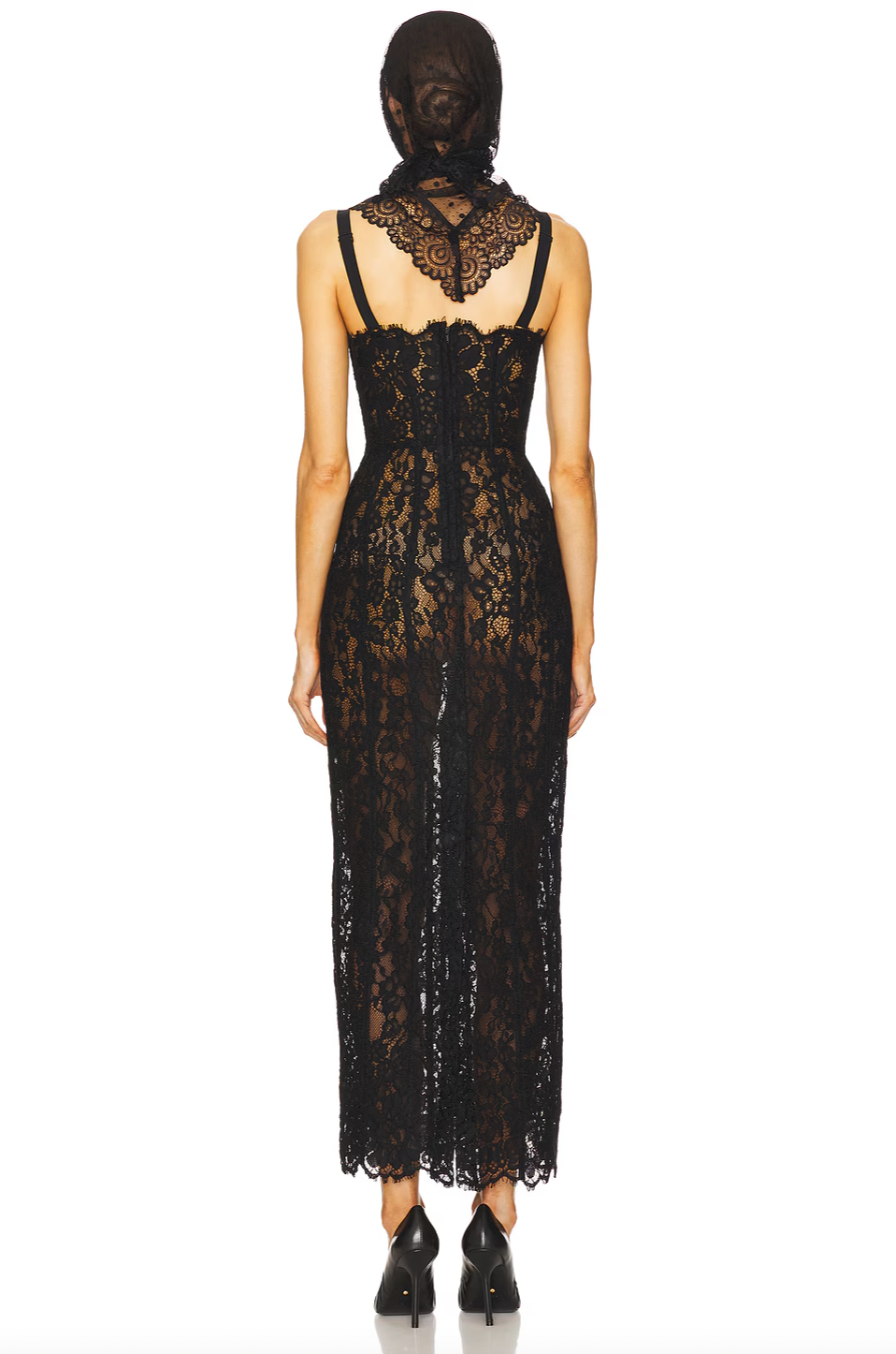 This Lace Column Dress by Helsa features a delicate bustier design with adjustable shoulder straps for a customized fit. The unlined construction offers a lightweight, breathable feel, while the hidden back zipper ensures a seamless silhouette. Crafted with intentionally sheer fabric, this dress subtly reveals undergarments, adding an element of sophisticated allure. Perfect for those seeking an elegant yet daring statement piece.