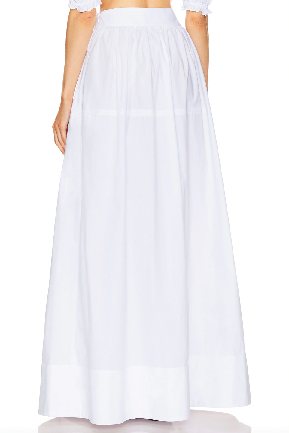 Crafted from 100% cotton lightweight poplin, this maxi skirt offers breathable comfort and a smooth drape. Designed with a hidden side zipper and side slip pockets, it combines practicality with a streamlined silhouette. The unlined construction enhances its light feel, making it ideal for warm weather wear. Note that this item is sold individually, allowing for versatile styling options. Machine washable for easy care, it delivers both function and refined simplicity.