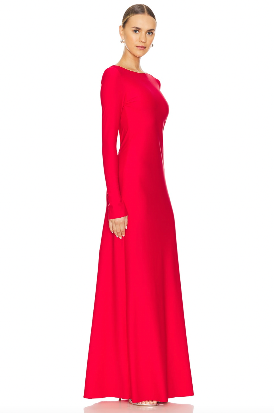 The Sabrine Dress combines elegance with subtle allure, featuring a low-cut back adorned with a delicate rhinestone-embellished leaf design that adds a refined sparkle. Crafted from slinky jersey fabric, it offers a smooth drape and comfortable fit, ideal for sophisticated occasions demanding both style and ease.
