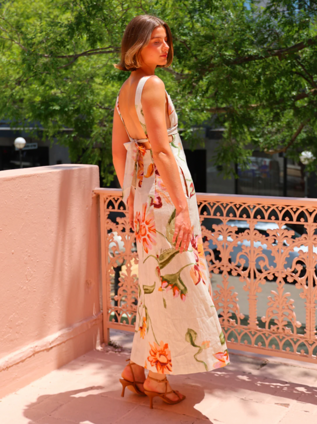 The Isolde Dress in Raphia Bloom by Roame combines expert craftsmanship with natural elegance, featuring a lightweight, breathable fabric ideal for warm weather. Its floral maxi silhouette offers refined comfort and style, making it a versatile choice for garden parties, casual brunches, and other sunny-day events. This dress elevates your wardrobe by seamlessly blending sophistication with nature-inspired beauty.