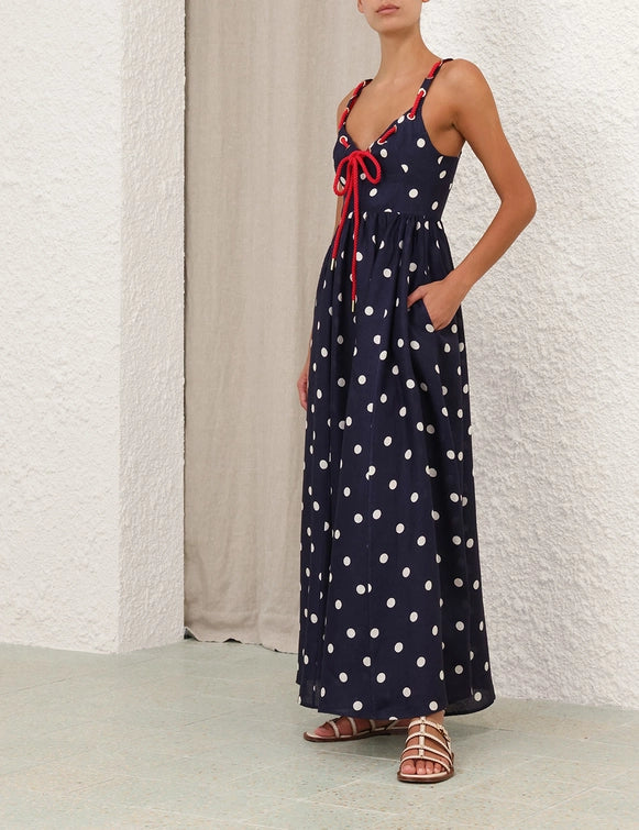 The Scarborough Eyelet Maxi Dress by Zimmermann blends classic style with expert tailoring. Crafted from linen, it features a V-neckline enhanced by rope tie detailing woven through the straps and bust for a refined, textured look. The shirred bodice ensures a flattering fit, complemented by adjustable straps and an invisible back zip with hook-and-eye closure for ease and comfort. 