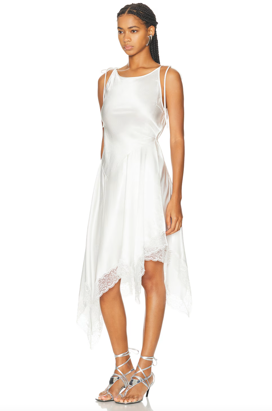 The Doyla Satin Lace Dress by Acne Studios features elegant shoulder tie-up closures and a wrap-style silhouette secured with a side tie-up, allowing for a customizable fit. Crafted from smooth satin fabric, it is delicately trimmed with lace for a refined touch. The asymmetrical hem enhances its sophisticated design, making this dress a perfect choice for occasions that demand both comfort and style.