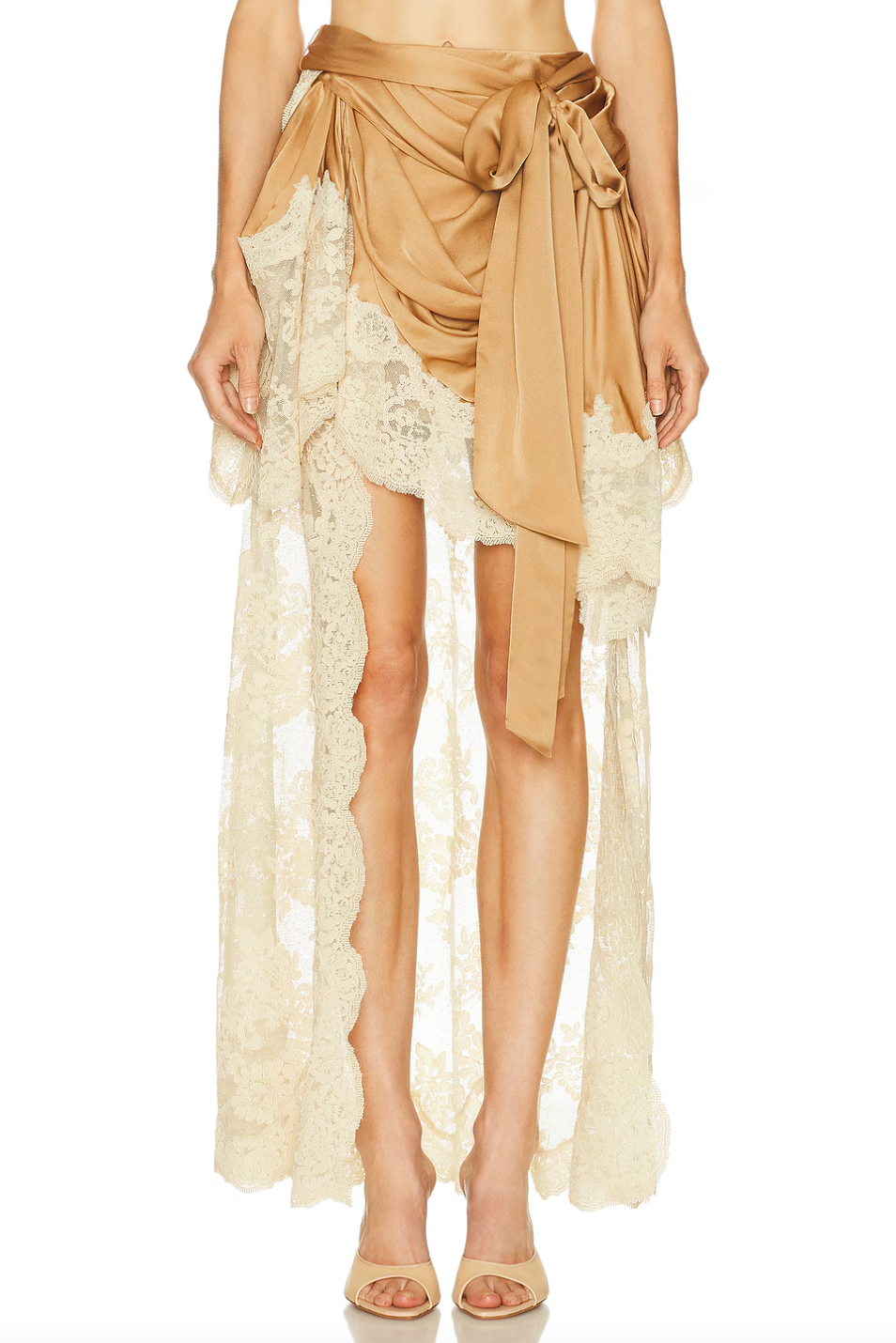 Crafted from midweight satin, the Hypnotic Satin Drape Skirt by Zimmermann features a refined asymmetrical hem accented with delicate lace trim for subtle elegance. Its partially lined design ensures comfort and movement, while a hidden back zip closure offers a sleek silhouette. The detachable belt with a front tie allows for versatile styling, making this skirt a sophisticated addition to any wardrobe. Please note, the piece is sold separately and not as a set.