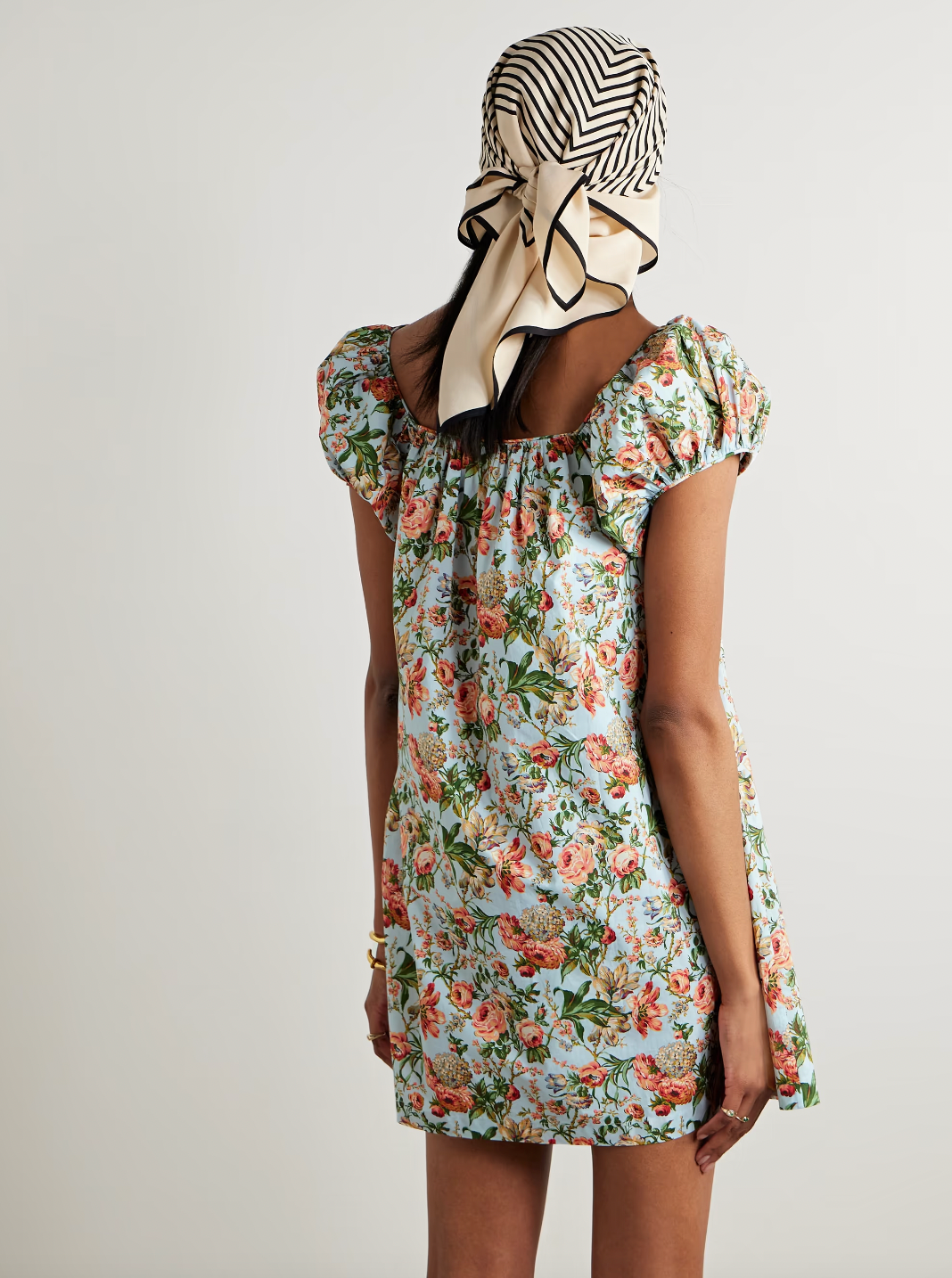 Crafted from lightweight cotton-poplin, the Julie floral-print mini dress offers breathable comfort with a refined texture ideal for warm weather. The delicate floral pattern adds a timeless, feminine touch, while the mini length provides a modern, flattering silhouette. This dress is perfect for effortless daytime elegance, combining soft fabric with expert tailoring to ensure both style and comfort throughout the day.