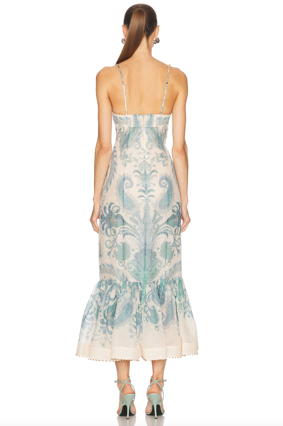 The Illuminate Gown by Zimmermann features a fully lined bustier design that ensures a flattering fit and comfortable wear. Its hidden back zipper closure offers a sleek silhouette, while adjustable shoulder straps provide customizable support. Crafted from premium linen, the gown combines breathable comfort with a structured skirt detail, lending an elegant and refined shape suitable for sophisticated occasions.