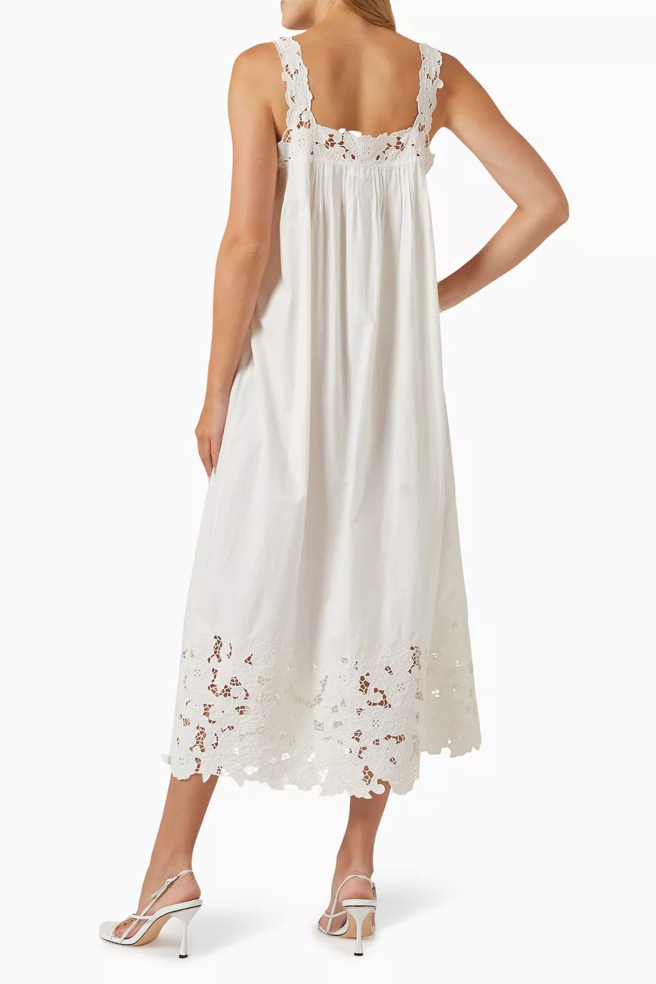 The Ellen Dress in Cotton by DÔEN blends sustainable design with refined craftsmanship. Made from GOTS-certified organic cotton, it offers a breathable, lightweight feel perfect for warm days. Hand-placed floral embroidery adds delicate detail, enhancing its ethereal appeal. Designed with an airy fit, this dress ensures comfort and effortless style, ideal for spontaneous outings or relaxed occasions.