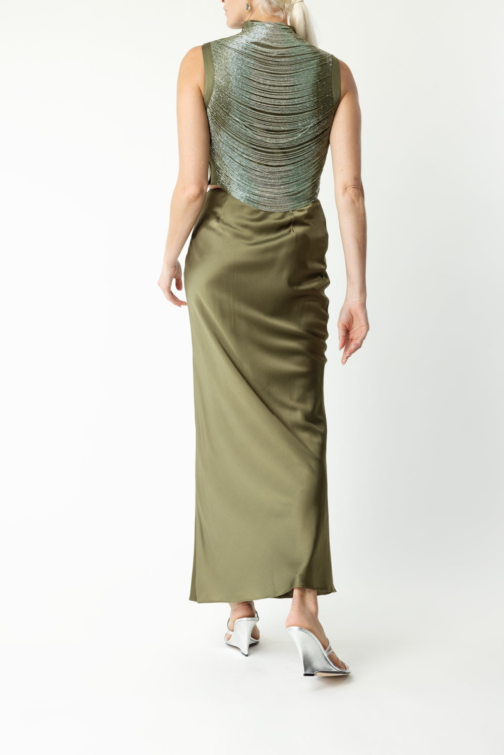 The Cult Gaia Chantel Skirt in cedar offers a sophisticated blend of texture and color that elevates any wardrobe. Crafted with attention to detail, its rich cedar hue provides a warm, earthy tone perfect for transitional seasons. This skirt combines refined structure with comfortable wearability, making it an ideal choice for both casual and elegant occasions. Its versatile design allows seamless pairing with a variety of tops and accessories, ensuring a polished look that reflects expert styling.