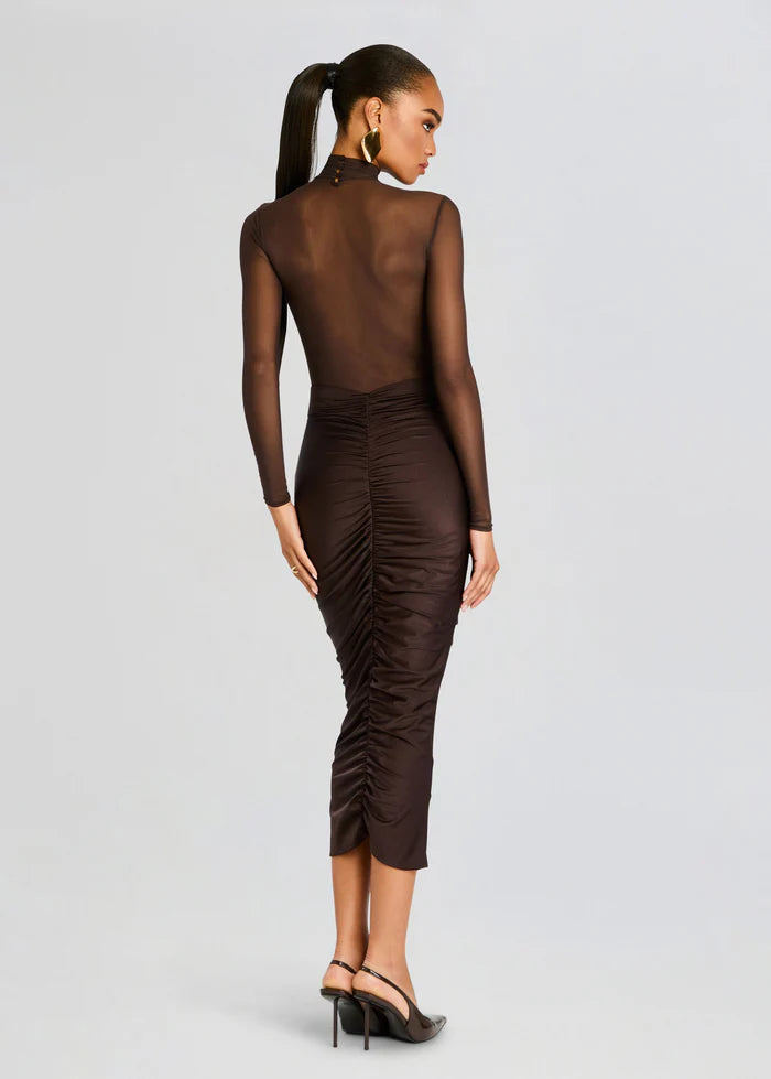 Elevate your style with the Levina Dress by SEROYA, a masterful blend of modern elegance and refined allure. This bodycon midi piece features a sheer bodice paired with a sleek bandeau detail, expertly tailored to accentuate your silhouette with subtle sophistication. Perfect for occasions demanding both poise and a touch of boldness, the Levina Dress in Ash Brown offers a striking yet understated statement.