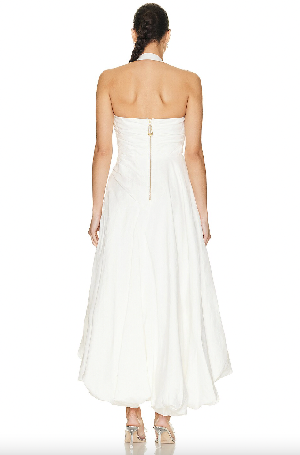 Elevate your wardrobe with the Mika Draped Split Midi Dress by Aje. Made from mid-weight ruched linen and fully lined for comfort, this dress features an asymmetrical hem that moves elegantly with every step. An exposed back zipper offers a contemporary touch, complemented by gold-tone and faux pearl details on the halter-neck strap, creating a sophisticated look ideal for formal occasions. This dress blends timeless design with expert craftsmanship for a polished, refined presence.