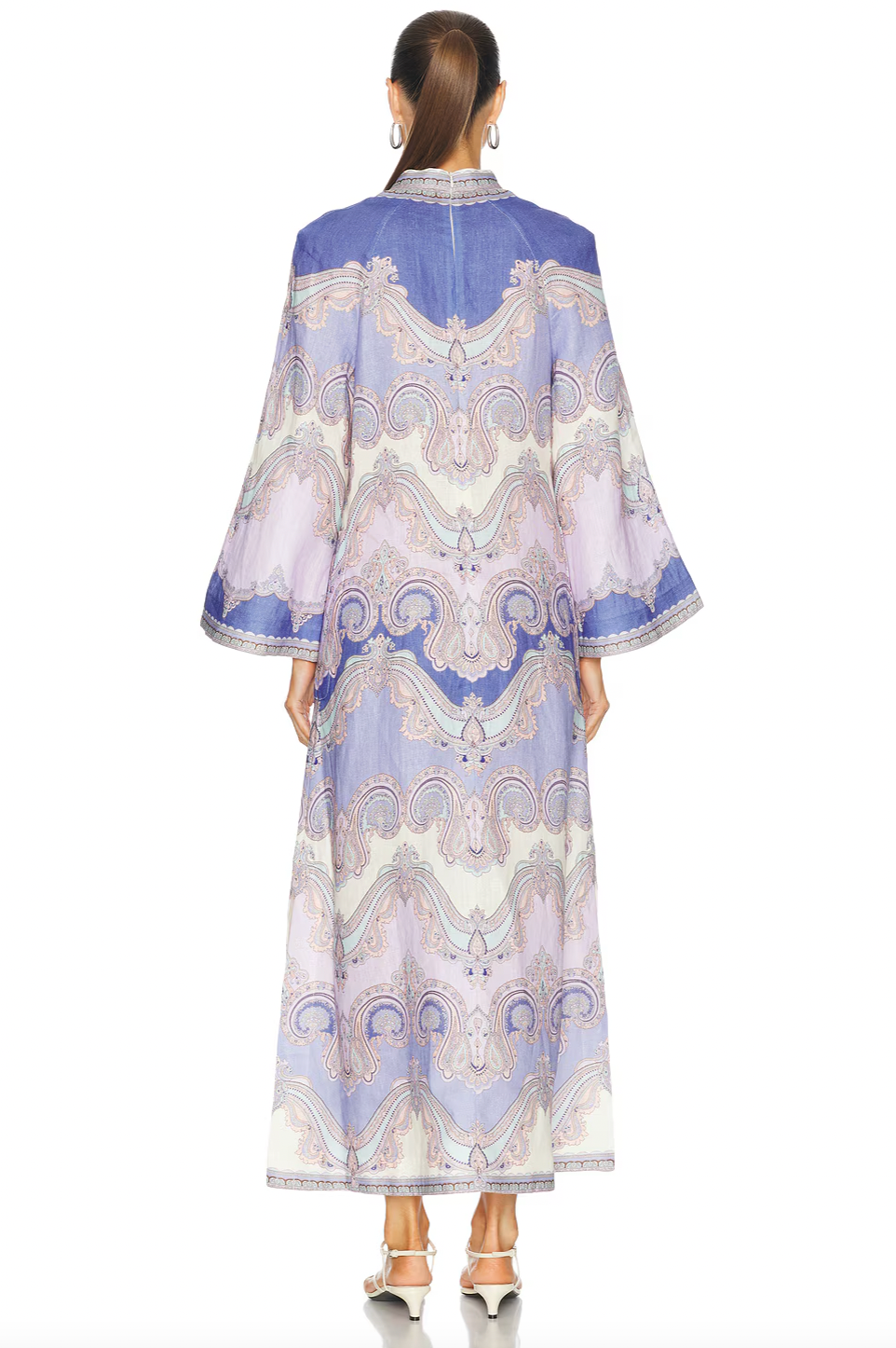 Elevate your wardrobe with the Maxine Midi Dress in delicate light purple by Zimmermann. Expertly designed with a plunging V-neckline and discreet rear zip, it offers both sophistication and comfort. Practical front patch pockets blend seamlessly with the refined silhouette, while side slits provide fluid movement and effortless elegance. Ideal for those seeking a polished look with functional details at any event.