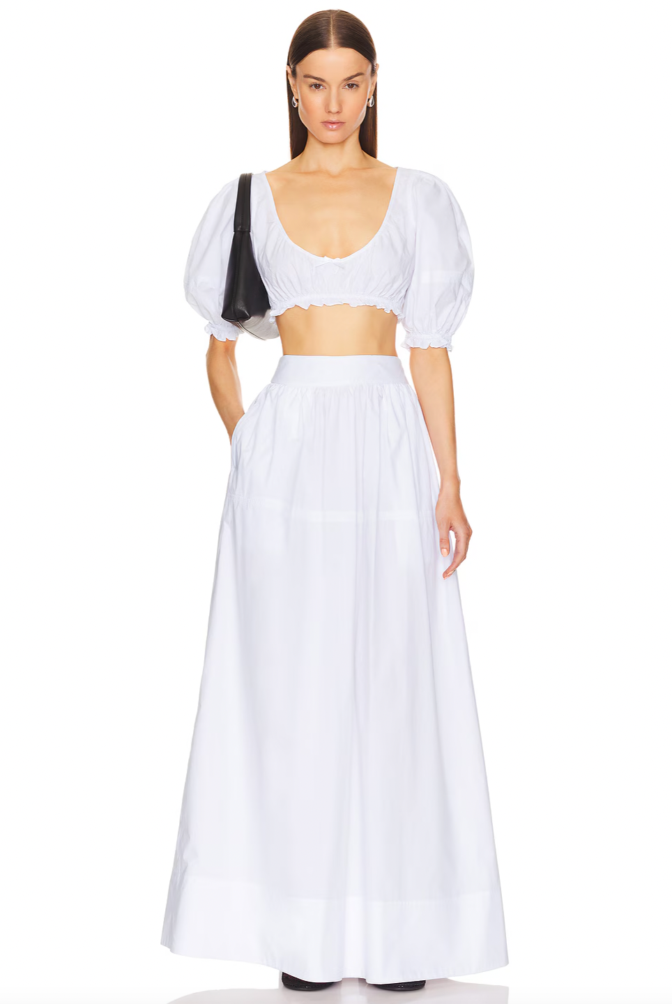 Crafted from 100% cotton lightweight poplin, this maxi skirt offers breathable comfort and a smooth drape. Designed with a hidden side zipper and side slip pockets, it combines practicality with a streamlined silhouette. The unlined construction enhances its light feel, making it ideal for warm weather wear. Note that this item is sold individually, allowing for versatile styling options. Machine washable for easy care, it delivers both function and refined simplicity.