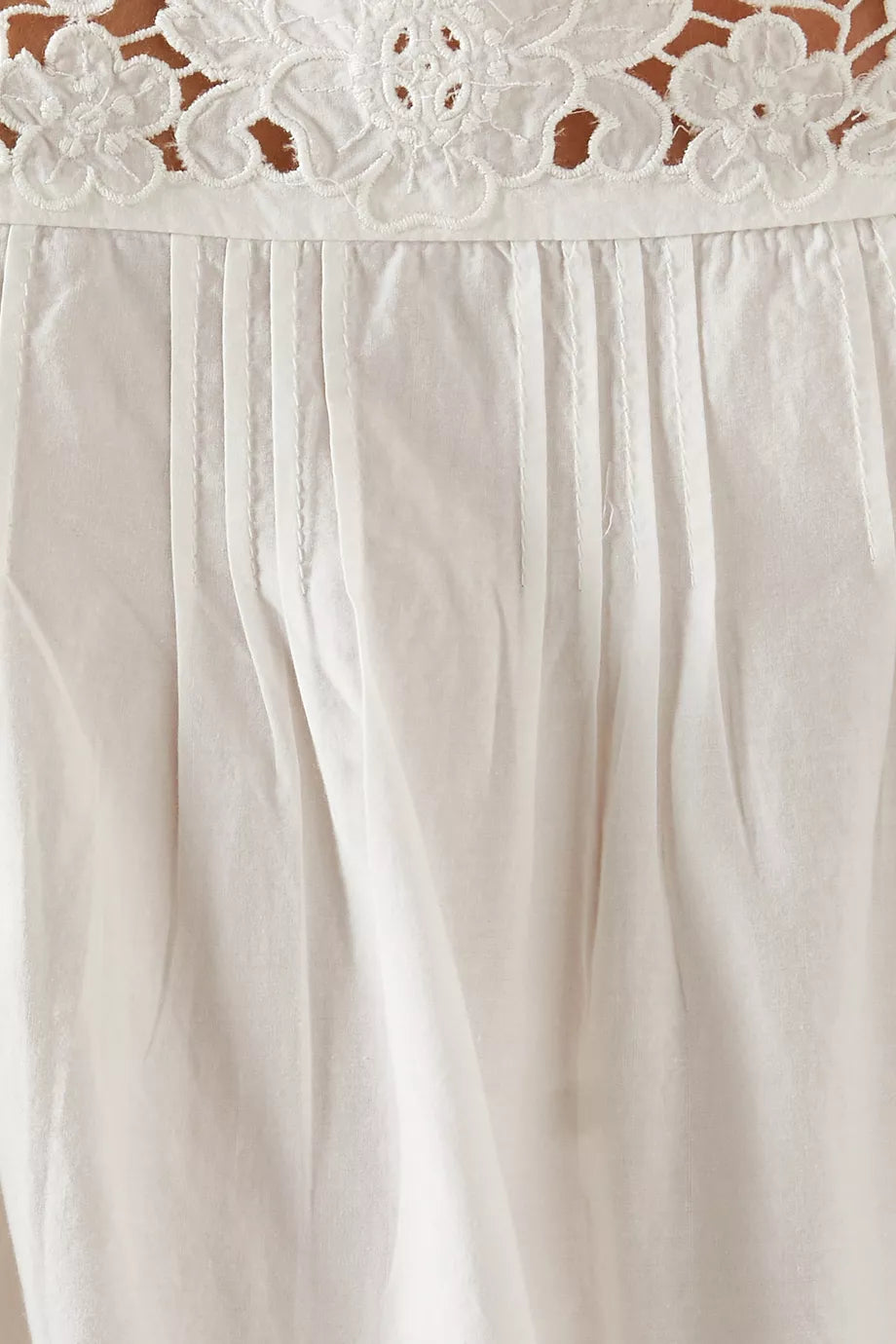 The Ellen Dress in Cotton by DÔEN blends sustainable design with refined craftsmanship. Made from GOTS-certified organic cotton, it offers a breathable, lightweight feel perfect for warm days. Hand-placed floral embroidery adds delicate detail, enhancing its ethereal appeal. Designed with an airy fit, this dress ensures comfort and effortless style, ideal for spontaneous outings or relaxed occasions.