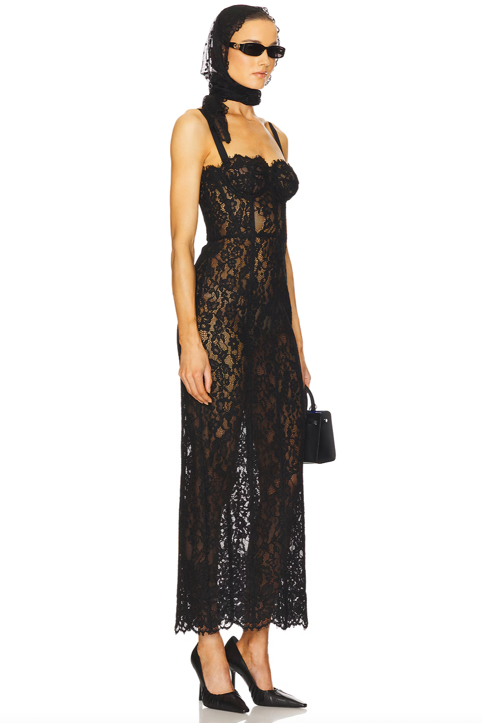 This Lace Column Dress by Helsa features a delicate bustier design with adjustable shoulder straps for a customized fit. The unlined construction offers a lightweight, breathable feel, while the hidden back zipper ensures a seamless silhouette. Crafted with intentionally sheer fabric, this dress subtly reveals undergarments, adding an element of sophisticated allure. Perfect for those seeking an elegant yet daring statement piece.