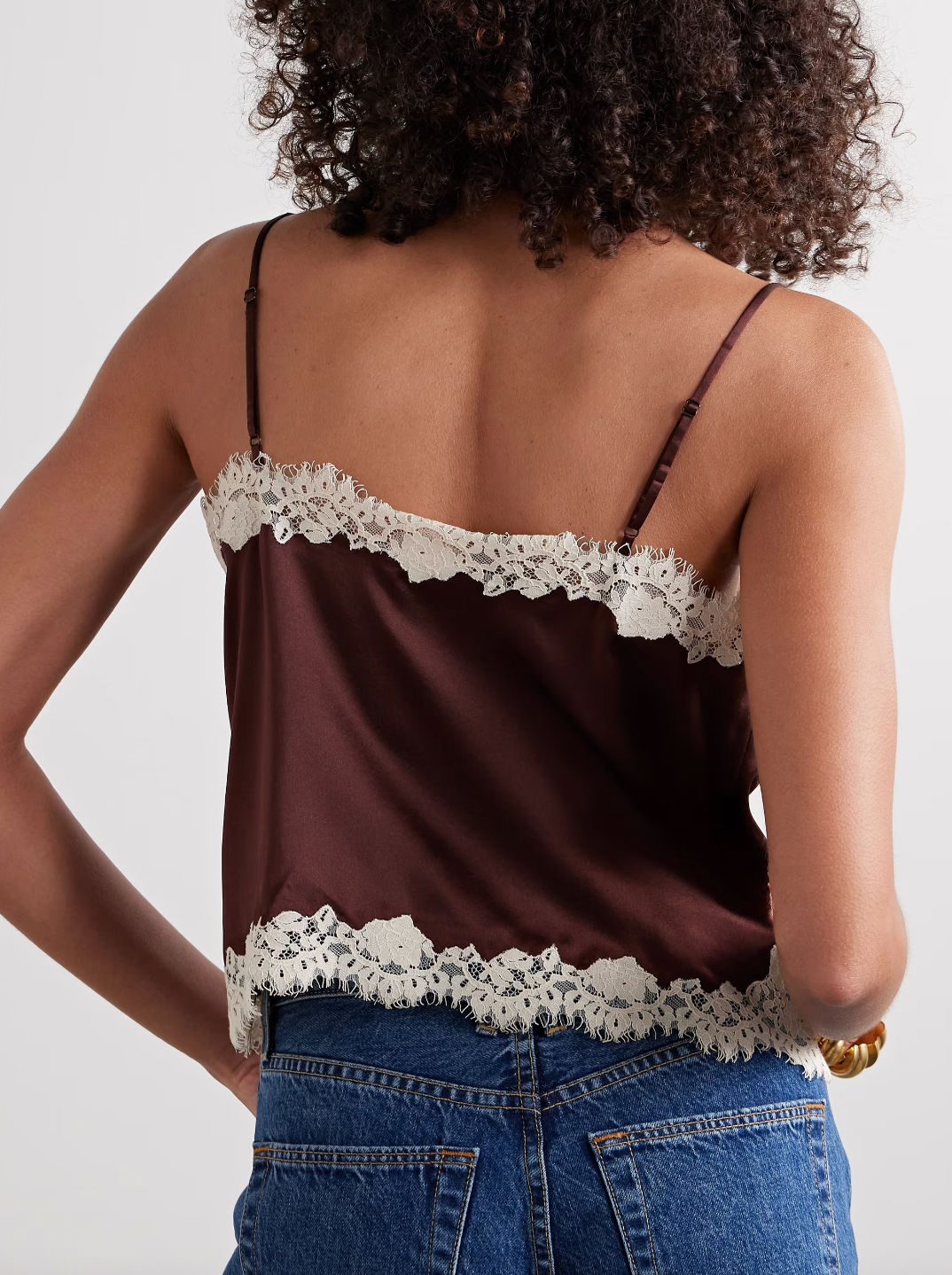 Experience refined elegance with the Kira corded lace-trimmed silk-satin camisole from DÔEN. Crafted from smooth silk-satin, it offers a luxurious feel against the skin, while the delicate corded lace adds an intricate, sophisticated detail. This camisole blends timeless design with a flattering fit, making it an ideal layering piece or statement alone for both day and evening wear. Its breathable fabric ensures comfort, enhancing your wardrobe with understated luxury.