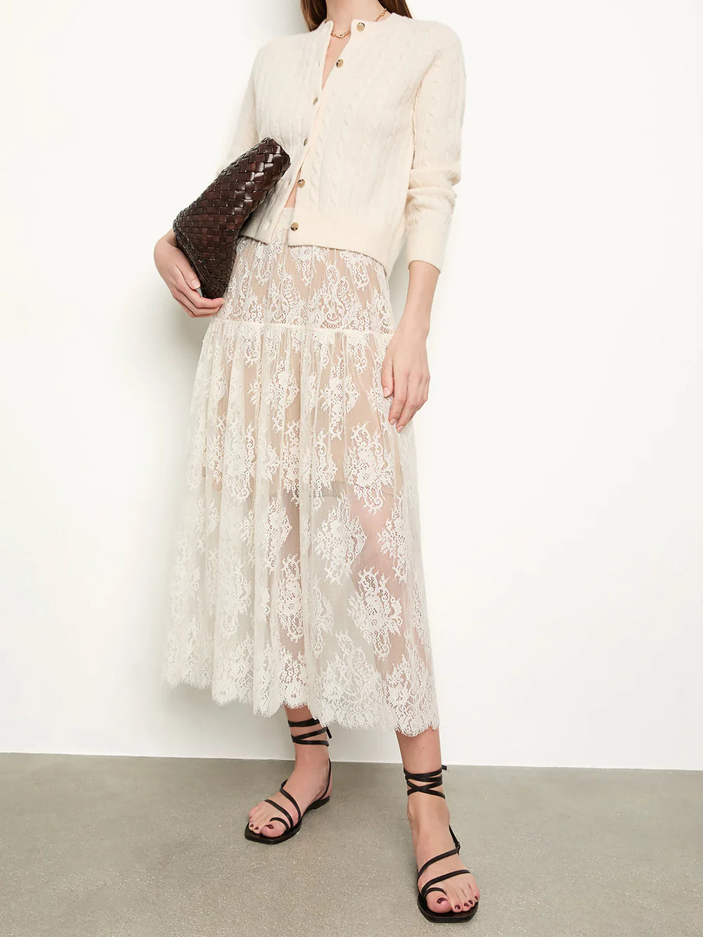 Crafted from delicate chantilly-inspired lace, the Sebastiane Skirt by Doen embodies timeless romance with its flattering A-line silhouette. The high waist creates an elegant line while the scalloped hem adds refined detail as it gracefully reaches mid-shin. Unlined for a lightweight feel, this piece pairs beautifully with a slip for your preferred level of coverage. A sophisticated choice for occasions calling for understated femininity.