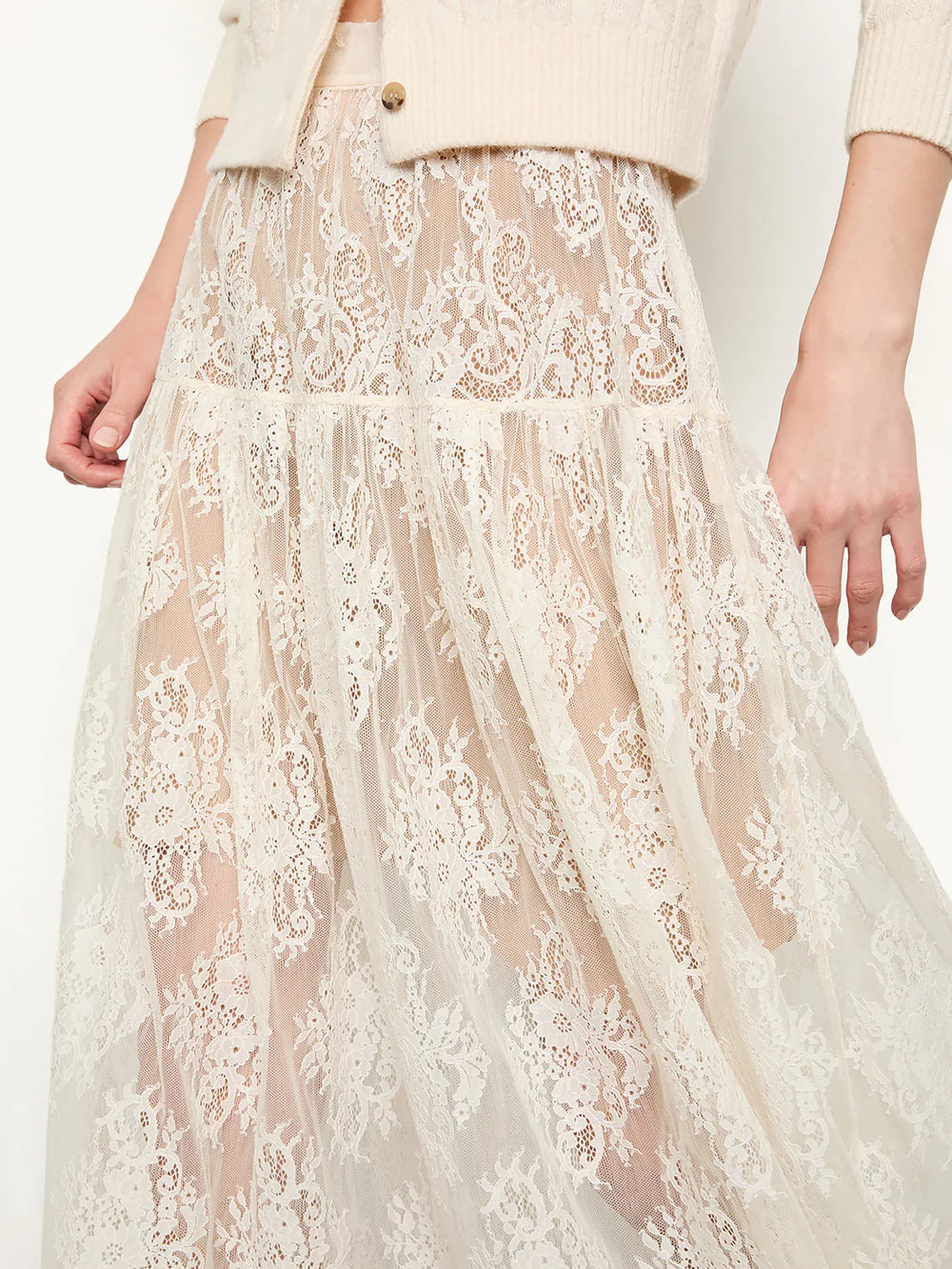 Crafted from delicate chantilly-inspired lace, the Sebastiane Skirt by Doen embodies timeless romance with its flattering A-line silhouette. The high waist creates an elegant line while the scalloped hem adds refined detail as it gracefully reaches mid-shin. Unlined for a lightweight feel, this piece pairs beautifully with a slip for your preferred level of coverage. A sophisticated choice for occasions calling for understated femininity.