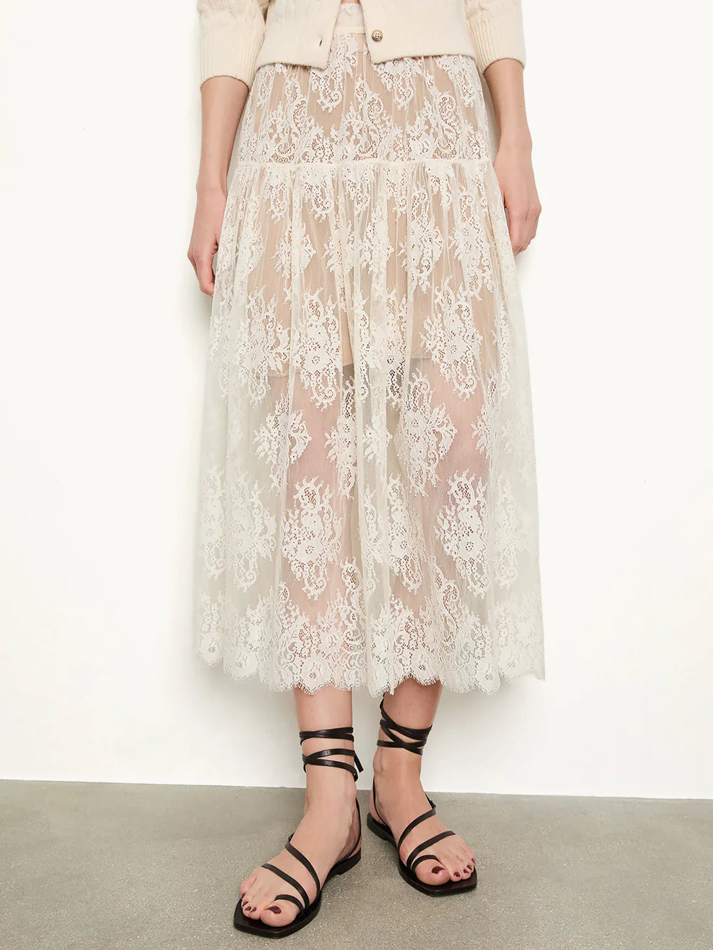 Crafted from delicate chantilly-inspired lace, the Sebastiane Skirt by Doen embodies timeless romance with its flattering A-line silhouette. The high waist creates an elegant line while the scalloped hem adds refined detail as it gracefully reaches mid-shin. Unlined for a lightweight feel, this piece pairs beautifully with a slip for your preferred level of coverage. A sophisticated choice for occasions calling for understated femininity.