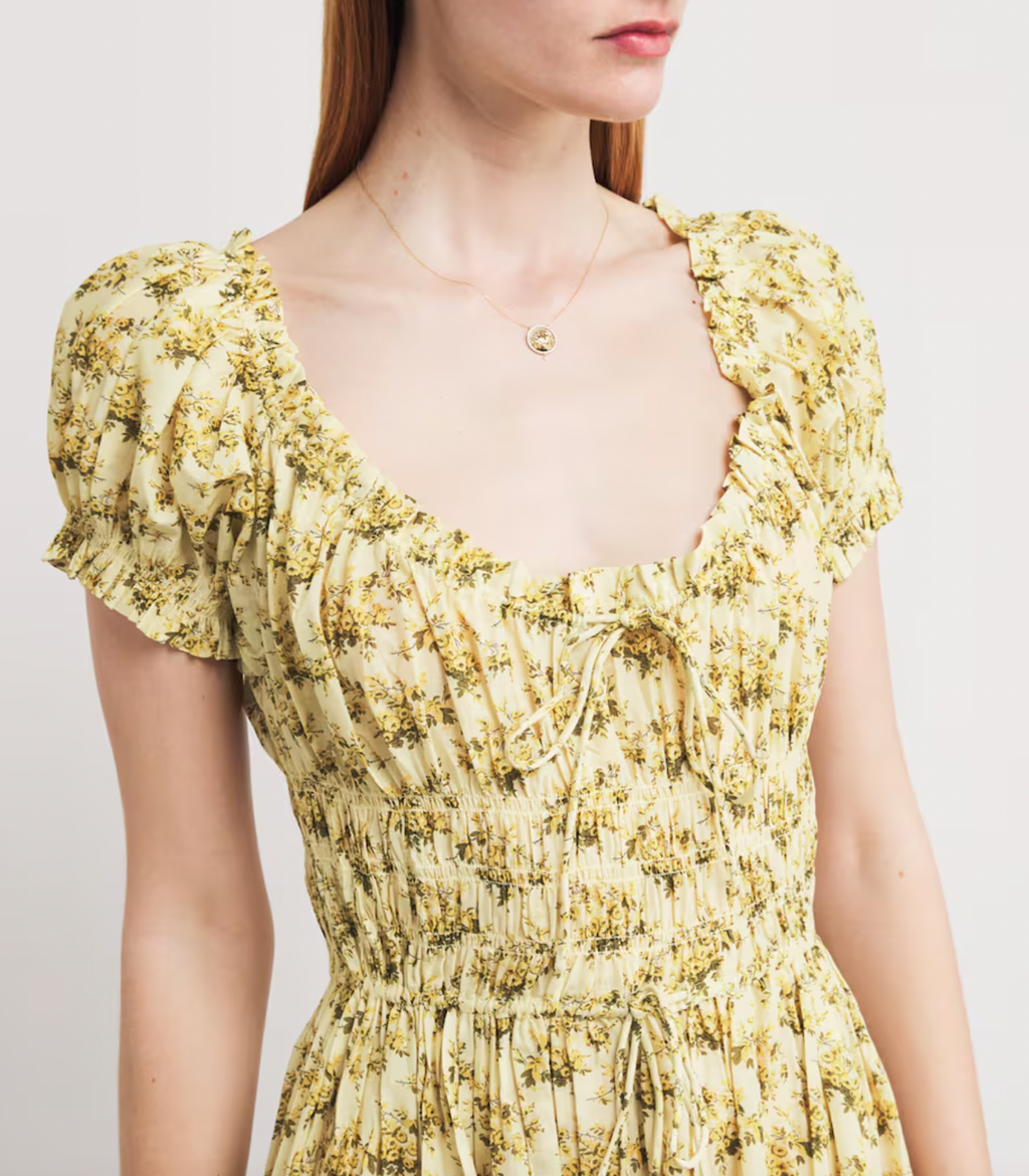 The Ashlynn Maxi Dress by DÔEN combines timeless elegance with practical design through its adjustable tie waist, enhancing comfort and fit. This dress exemplifies that ethos with its Victorian-inspired floral print and delicate puffed sleeves. This maxi silhouette delivers a refined yet effortlessly graceful look, perfect for those who appreciate thoughtful craftsmanship and poetic style.