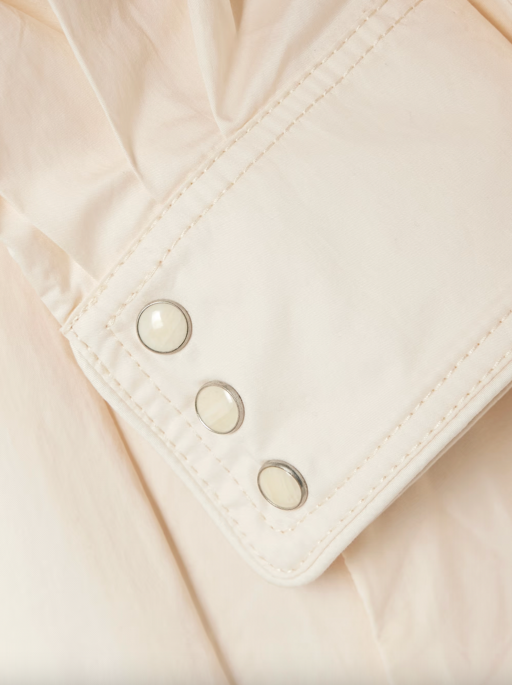 Johanna Ortiz’s Vela De Cruz midi shirt dress elevates a timeless silhouette with expertly tailored cotton-blend poplin. The finely pleated fabric adds refined texture, while the self-tie belt accentuates the waist for a flattering shape. Carefully selected tonal and silver-tone buttons enhance the sophisticated appeal, making this dress a versatile choice for polished, confident dressing.