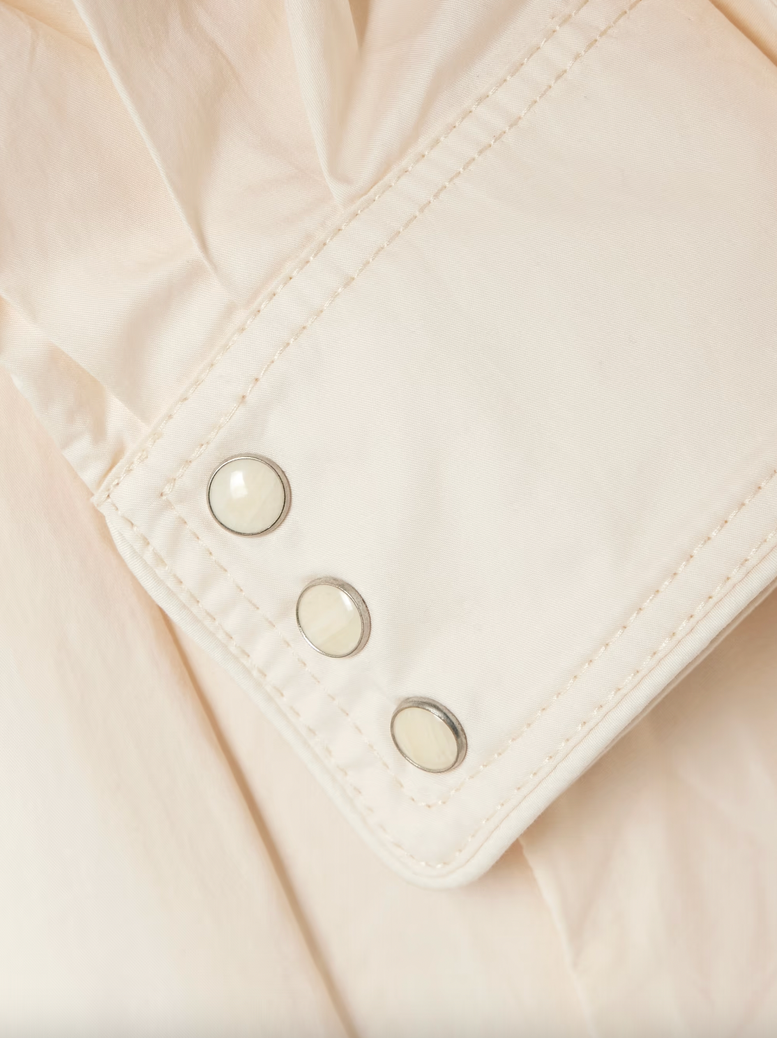 Johanna Ortiz’s Vela De Cruz midi shirt dress elevates a timeless silhouette with expertly tailored cotton-blend poplin. The finely pleated fabric adds refined texture, while the self-tie belt accentuates the waist for a flattering shape. Carefully selected tonal and silver-tone buttons enhance the sophisticated appeal, making this dress a versatile choice for polished, confident dressing.