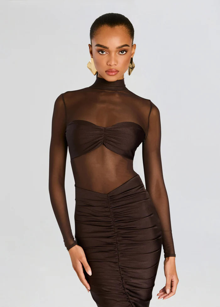 Elevate your style with the Levina Dress by SEROYA, a masterful blend of modern elegance and refined allure. This bodycon midi piece features a sheer bodice paired with a sleek bandeau detail, expertly tailored to accentuate your silhouette with subtle sophistication. Perfect for occasions demanding both poise and a touch of boldness, the Levina Dress in Ash Brown offers a striking yet understated statement.
