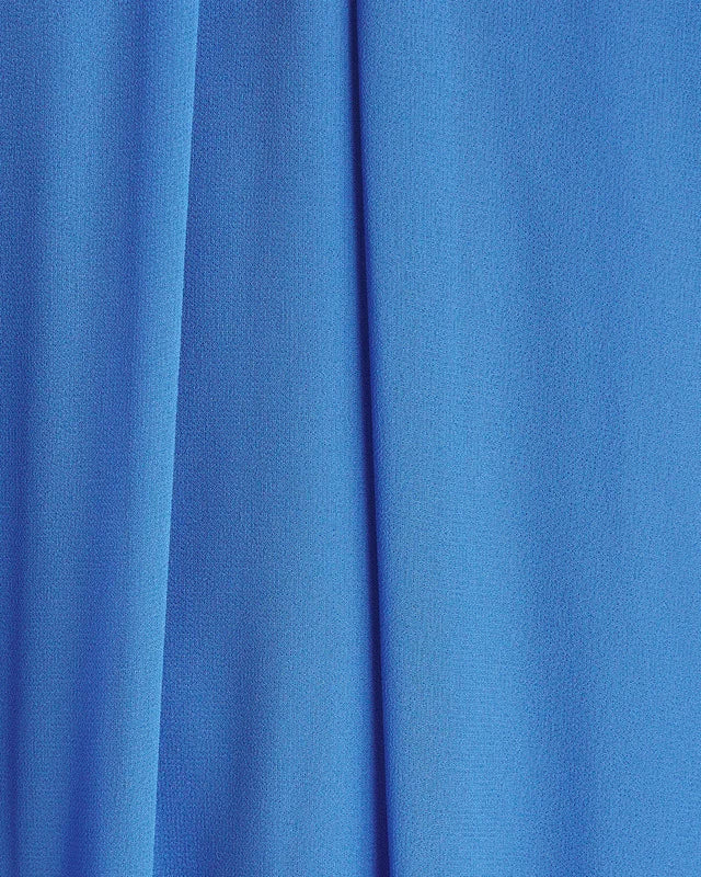 The Dress Sabrina Halterneck Ruffled Maxi by Malina features an elegant halterneck silhouette with a flattering open back. Its ruffled skirt adds movement and charm, while the tie at the neck ensures a customizable and secure fit. Perfect for formal occasions, this dress combines sophistication with feminine detail.