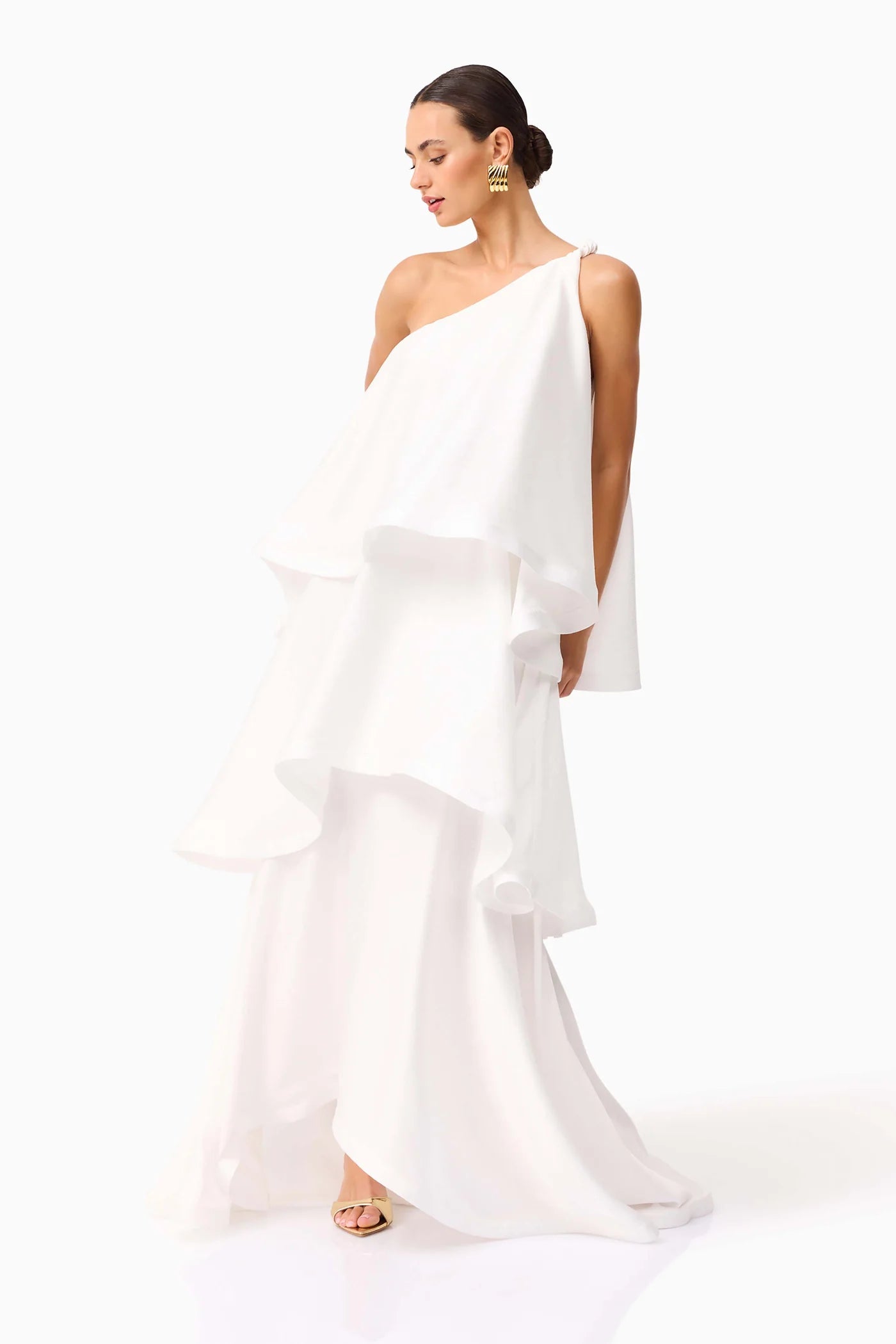 The Tilly Maxi Dress combines refined elegance with effortless comfort, featuring a carefully crafted flared tiered silhouette. Designed to complement both casual day outings and upscale evening events, this dress offers versatile sophistication for the discerning woman seeking style and grace in every occasion.