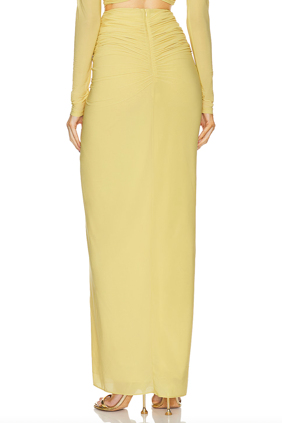 Expertly crafted, the Chase Skirt and Bebe Top by Ronny Kobo features a fully lined design for comfort and structure. Its hidden back zipper ensures a sleek silhouette and easy wear. The ruched slinky jersey fabric offers a sophisticated stretch and subtle texture, enhancing fit and movement. Ideal for occasions where refined style and ease are essential.