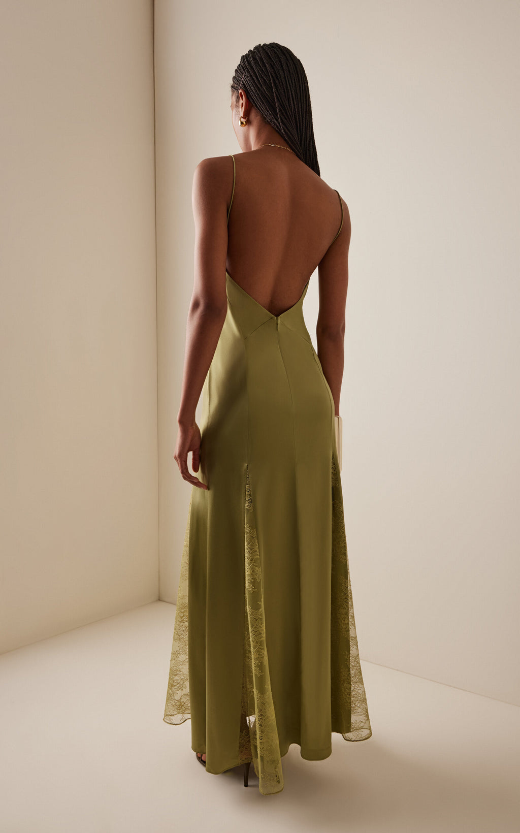 Crafted exclusively for refined elegance, the Trinity Lace-Inset Silk Maxi Slip Dress features stretch-silk satin tailored to enhance your silhouette. Its hem is detailed with tonal lace godets that extend gracefully to the hip, adding subtle texture and movement while maintaining a sleek, flattering fit. This dress combines luxurious fabric and thoughtful design for a sophisticated statement.