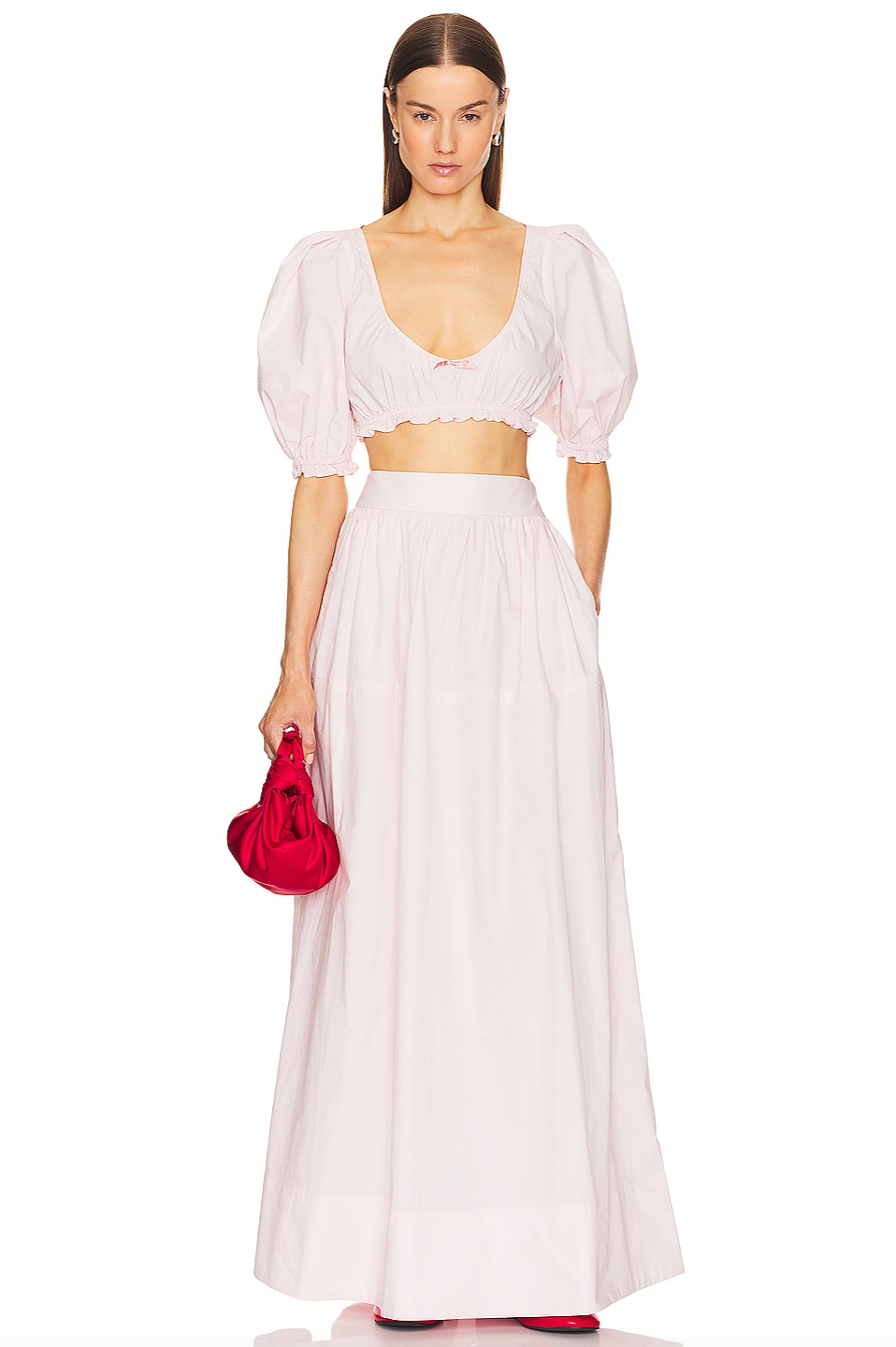 Crafted from 100% cotton lightweight poplin, this maxi skirt offers breathable comfort and a smooth drape. Designed with a hidden side zipper and side slip pockets, it combines practicality with a streamlined silhouette. The unlined construction enhances its light feel, making it ideal for warm weather wear. Note that this item is sold individually, allowing for versatile styling options. Machine washable for easy care, it delivers both function and refined simplicity.