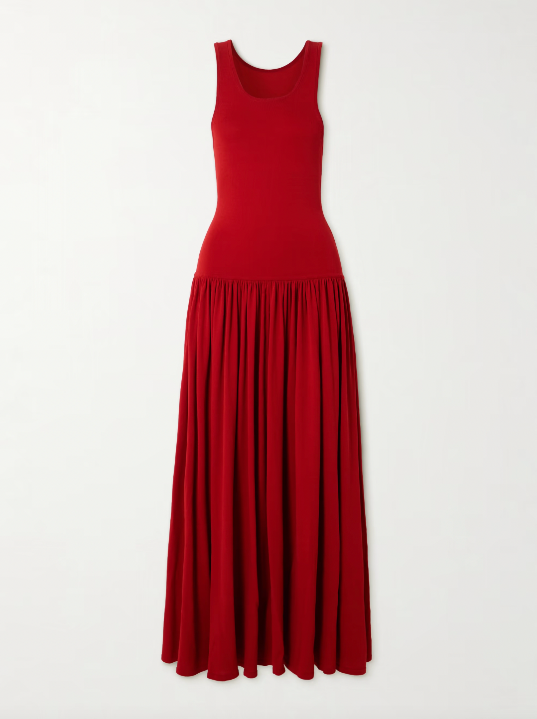 Loulou de Saison's Jada gathered knitted maxi dress expertly combines comfort, detail, and structure. Featuring a scoop neck reminiscent of a tank top, the dress flows gracefully into gathered pleats at the dropped waist, creating a flattering silhouette. Crafted for both style and ease, this red dress offers a refined yet relaxed look perfect for a variety of occasions.