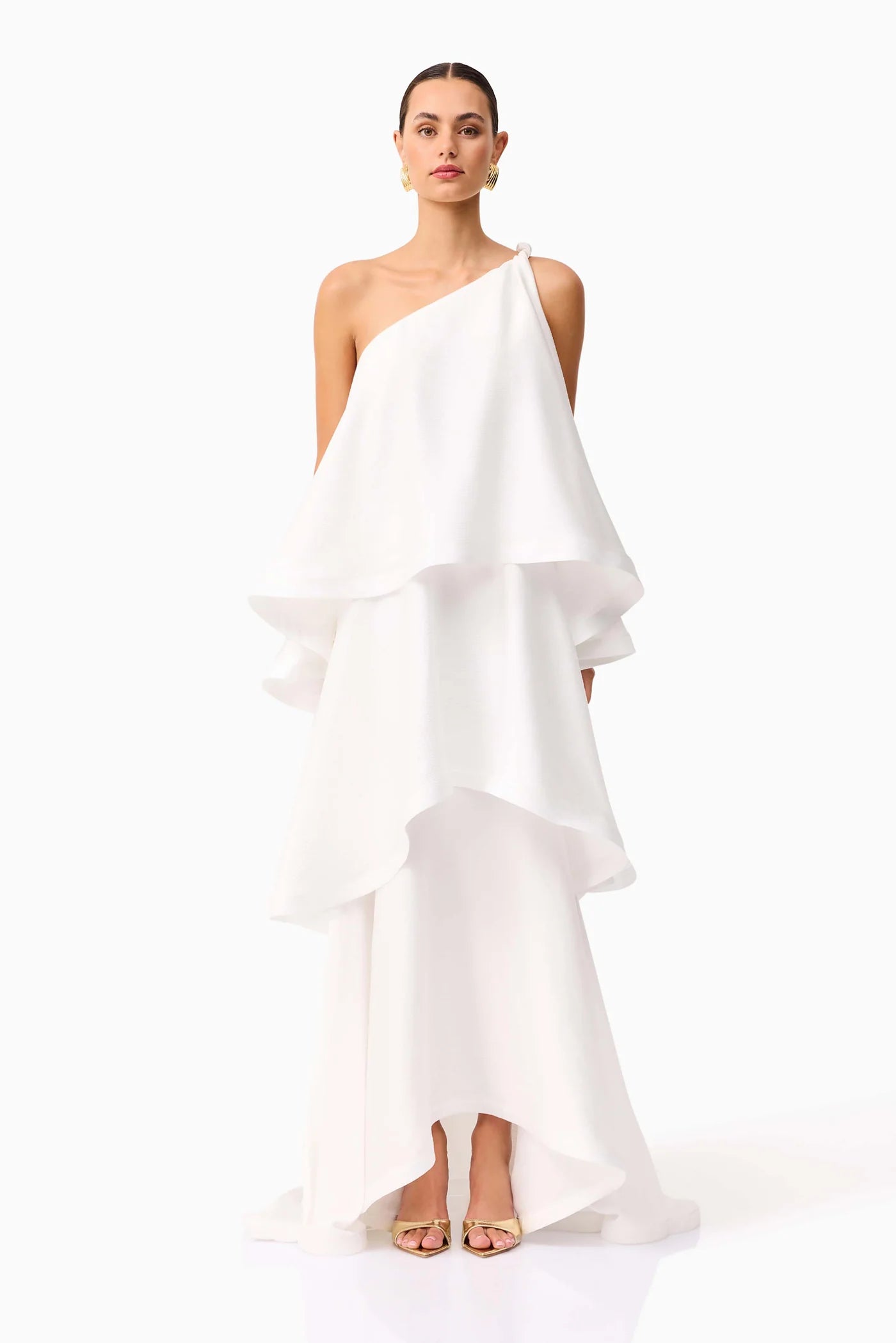 The Tilly Maxi Dress combines refined elegance with effortless comfort, featuring a carefully crafted flared tiered silhouette. Designed to complement both casual day outings and upscale evening events, this dress offers versatile sophistication for the discerning woman seeking style and grace in every occasion.
