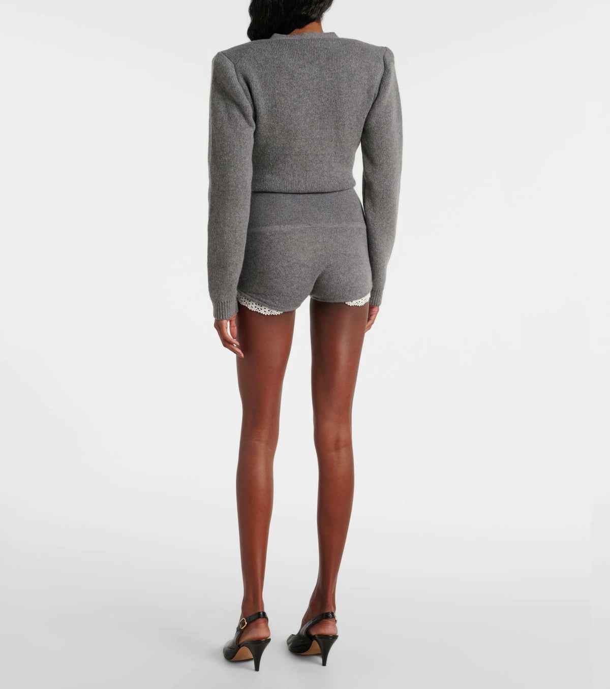 Elevate your wardrobe with these high-rise cashmere shorts by Magda Butrym. Crafted from luxurious cashmere, they offer exceptional softness and warmth while maintaining a tailored silhouette. The high-rise design enhances your natural waistline, providing a flattering and sophisticated fit, perfect for refined casual or layered styling.