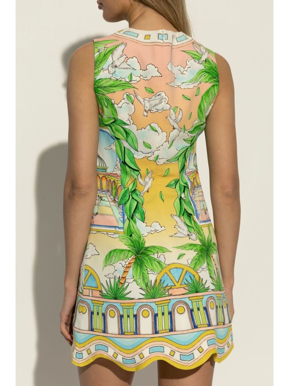 Elevate your wardrobe with the Paysage Ideal graphic-print minidress by Casablanca, expertly crafted in Italy. Featuring a vibrant grass green and multicolour all-over graphic print, this thigh-length dress showcases an A-line silhouette with a delicate scallop hem. The sleeveless design is complemented by a keyhole neck and front tie fastening, while a concealed rear zip ensures a seamless fit. 