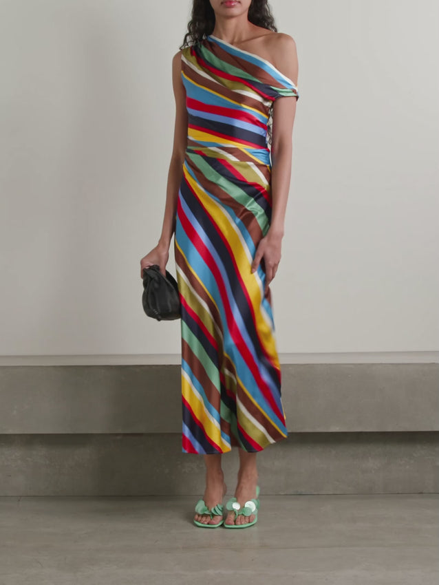 A striking midi dress that combines color and sophistication. Multicolored stripes dance across luxurious silk-blend fabric, while an expertly draped silhouette flatters with graceful movement. The shoulder-baring neckline and midi length create understated elegance, secured by a discreet side zip and hook closure. Effortlessly styled with mules for an elevated casual look.