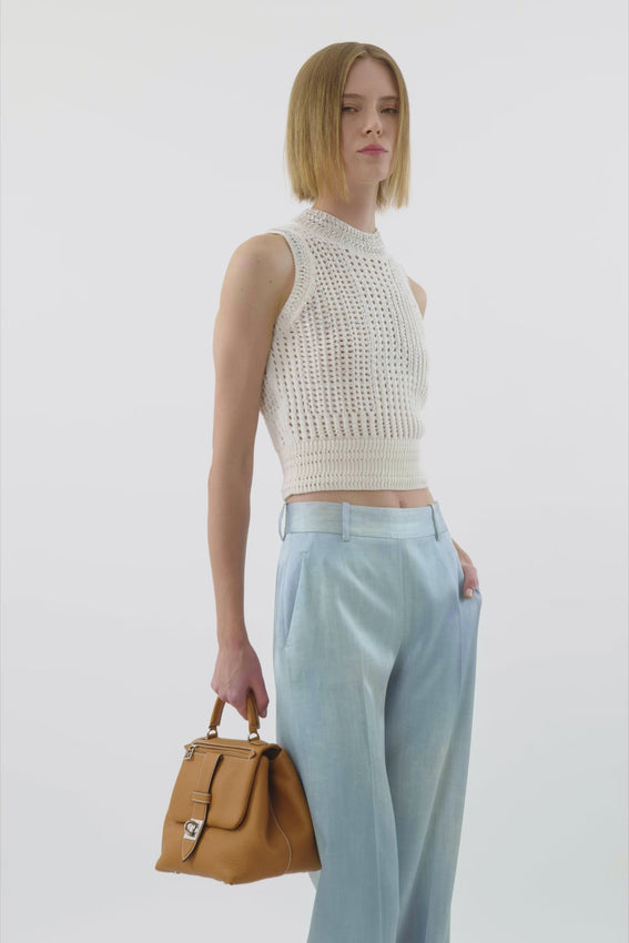 Elevate your wardrobe with these refined light blue wide-leg trousers from Ermanno Scervino. Crafted from luxurious 100% viscose, the fabric drapes beautifully with a subtle weave texture that catches the light. The relaxed wide-leg silhouette offers effortless elegance, while the standard waist ensures a comfortable, flattering fit. Perfect for creating polished, contemporary looks that transition seamlessly from office to evening occasions.