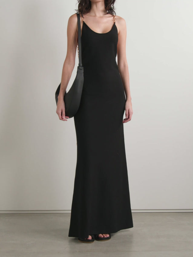 Inspired by Gabriela Hearst's Spring '25 collection, the Adeona dress celebrates the Roman goddess of safe return and the strength of women. Crafted from luxuriously smooth silk, this maxi dress features elegant gold-tone chain straps that catch the light with every movement. A timeless piece that honors both mythology and modern femininity, perfect for occasions that call for understated sophistication and meaningful style.