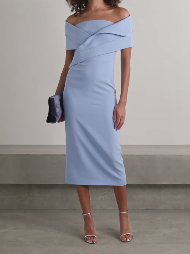 Elegance meets modern sophistication with the Iana off-the-shoulder draped crepe midi dress. This striking silhouette features a graceful draped neckline that frames the shoulders beautifully, while the flowing crepe fabric creates a flattering, fluid drape that moves with you. The midi length offers timeless versatility—perfect for evening events, special occasions, or elevated everyday wear. The off-the-shoulder design adds a touch of allure and femininity, making it an instant wardrobe essential. 