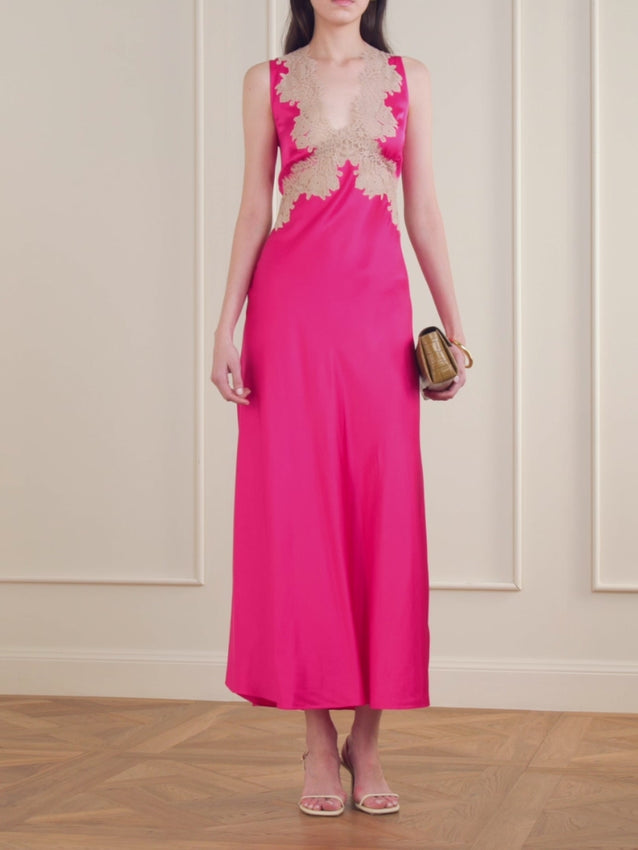 Inspired by vintage 1950s slip dresses, the Lysandra brings understated glamour to your wardrobe. This midi dress is cut from luxuriously fluid satin with a refined V-neckline accented by delicate lace trim. Hitting at the knee, it transitions seamlessly from day to night—simply throw on a wrap cardigan when temperatures drop for an instantly polished look.