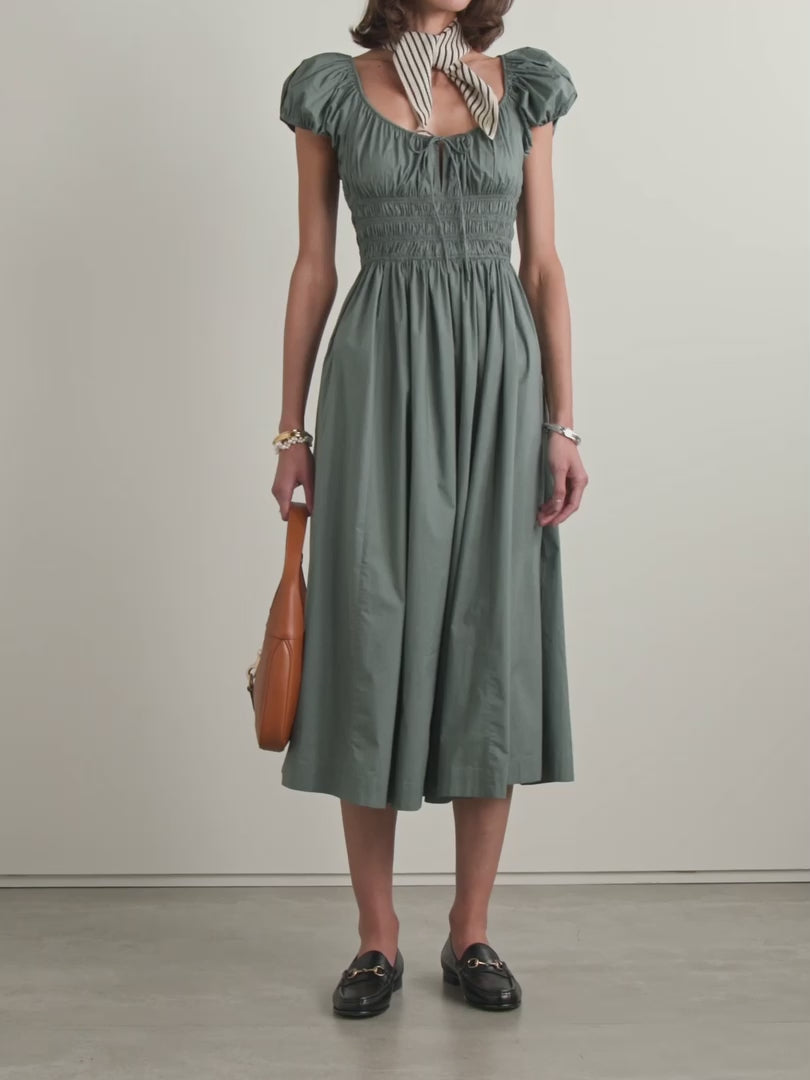 Crafted from organic cotton-poplin, the Quinn midi dress by Doen combines sustainable fabric with expert tailoring. Its shirred bodice and tie detailing create a flattering fit, enhancing natural curves while providing comfort. This versatile piece seamlessly transitions from day to evening, reflecting thoughtful design and eco-conscious materials in a refined silhouette.