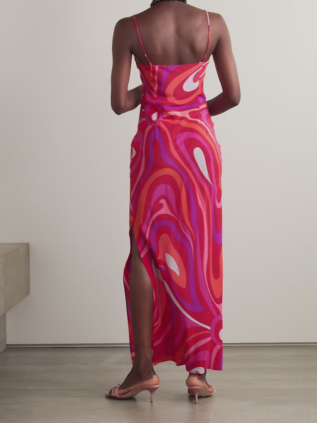 Elevate your wardrobe with this sophisticated Marmo printed silk crepe de chine maxi dress from PUCCI. Crafted from luxurious silk crepe de chine, this floor-length silhouette drapes beautifully while maintaining its elegant structure. The distinctive Marmo print adds visual intrigue and timeless appeal, making it an ideal choice for refined occasions. The fluid fabric ensures comfortable movement, while the maxi length provides understated glamour. 