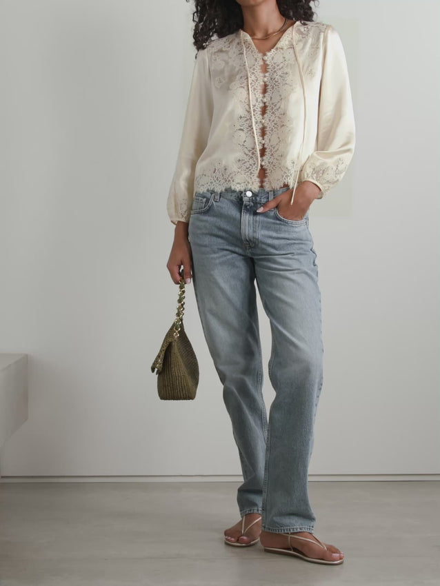 Discover romantic elegance with the Lucine blouse, a DÔEN signature piece crafted from luxurious cream silk-satin. Delicate lace trims frame the collar and placket, while gentle shoulder gathers create a subtle puffed silhouette that flatters effortlessly. Front button fastenings offer easy styling versatility—pair with inky denim for understated sophistication or printed skirts for a more expressive look. Composition: 100% silk with 100% cotton lace trim.