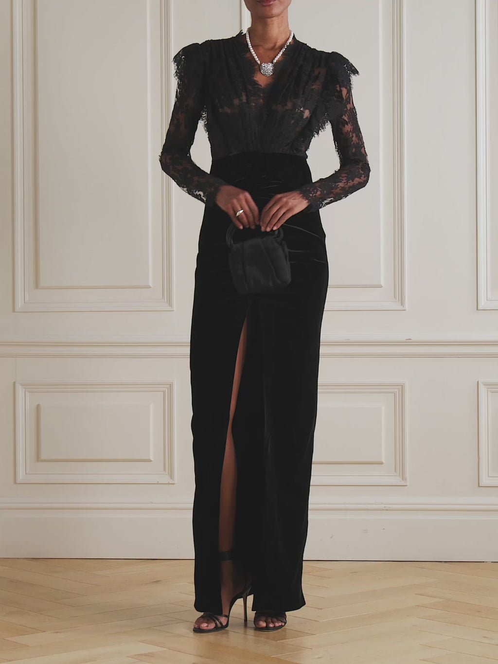 Elevate your evening wardrobe with this exquisite gown from Alessandra Rich. Crafted from sumptuous velvet and delicate lace, this piece seamlessly blends texture and refinement. The signature bow detail adds a touch of feminine elegance, creating a striking focal point that captures attention. Perfect for galas, formal celebrations, or any occasion demanding understated luxury, this gown drapes beautifully to flatter the silhouette while maintaining an air of timeless sophistication.