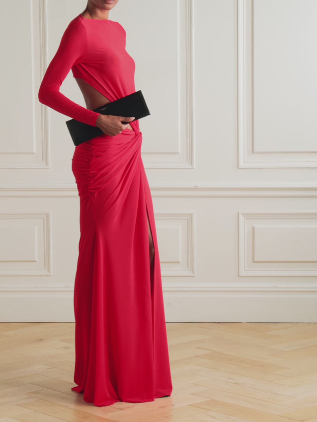 Command attention in this Alex Perry gown, where sustainable style meets red-carpet drama. The smooth recycled-crepe is expertly twisted and gathered at the front, cascading into an elegant floor-length silhouette. An open back creates an alluring focal point—ideal for showcasing in every angle. Slip it on and radiate effortless sophistication.