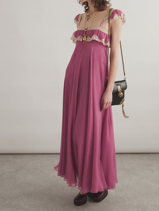 Effortless elegance meets sustainable luxury in this stunning maxi dress. Crafted from organic silk-crepon, the fabric drapes beautifully with a natural texture that moves with you. Delicate lace trim adorns the neckline and hem, adding romantic sophistication to the flowing silhouette. Perfect for evening events, special occasions, or elevated everyday wear. The breathable organic silk keeps you comfortable while the timeless design ensures you'll reach for it season after season.
