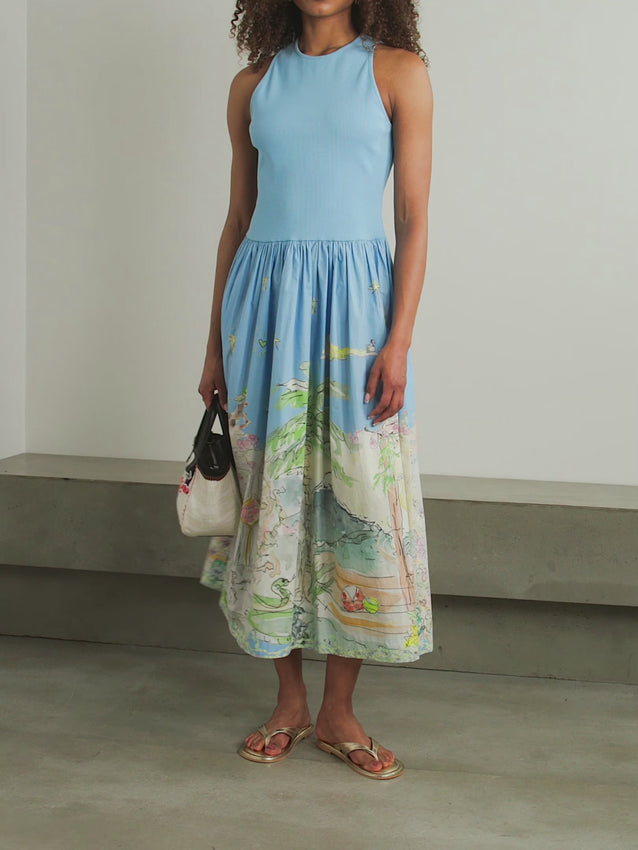 Embrace effortless elegance with this Anouk Midi Dress, a stunning collaboration between ALÉMAIS and Australian artist Anouk Colantoni. Crafted from organic cotton, it features a fitted ribbed jersey top paired with a flowing poplin midi skirt adorned with a vibrant beach-inspired print. Perfect for capturing that free-spirited, laid-back aesthetic, this piece seamlessly transitions from casual days to evening outings. The thoughtful blend of comfort and style makes it an essential addition to any wardrobe.
