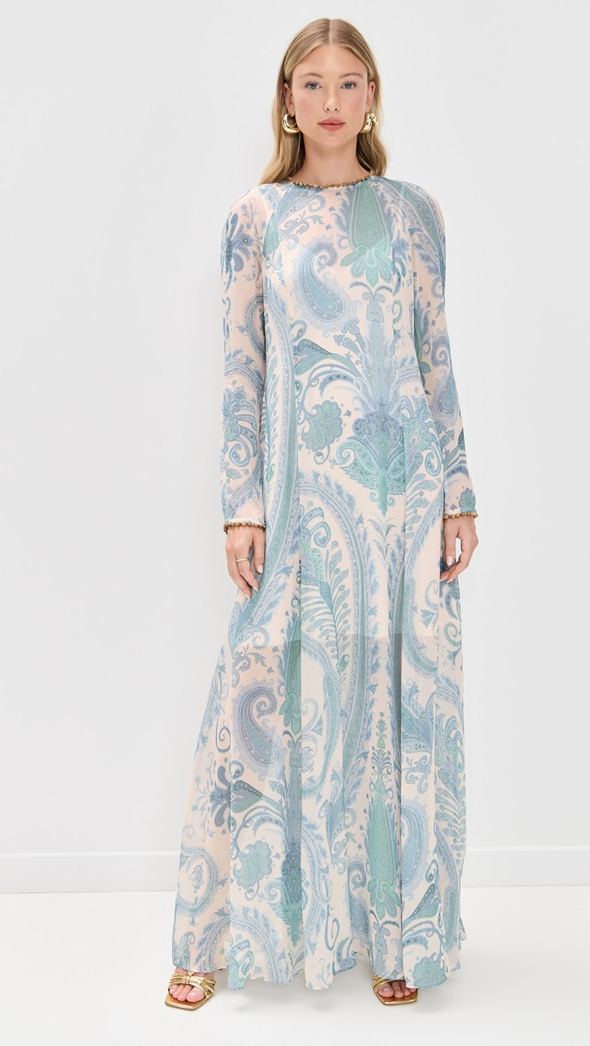 Crafted from lightweight, non-stretch chiffon, the Illuminate Sheath Dress by Zimmermann features an elegant paisley print that enhances its refined silhouette. The beaded neckline and cuffs add a touch of sophisticated detail, while the maxi length and crew neck provide classic coverage. A discreet back zipper ensures a tailored fit, making this dress a perfect choice for formal occasions where polished style is essential.