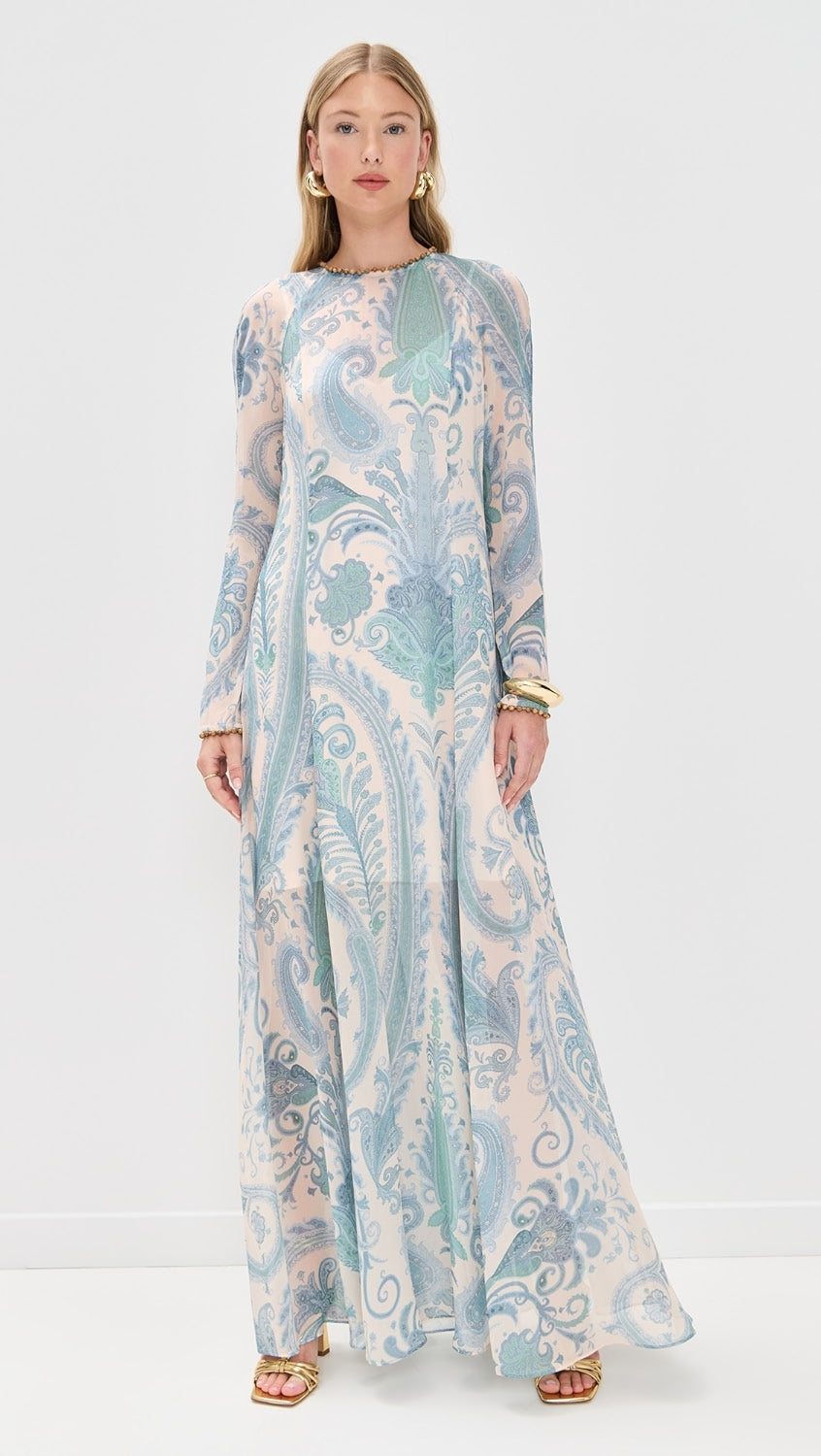 Crafted from lightweight, non-stretch chiffon, the Illuminate Sheath Dress by Zimmermann features an elegant paisley print that enhances its refined silhouette. The beaded neckline and cuffs add a touch of sophisticated detail, while the maxi length and crew neck provide classic coverage. A discreet back zipper ensures a tailored fit, making this dress a perfect choice for formal occasions where polished style is essential.